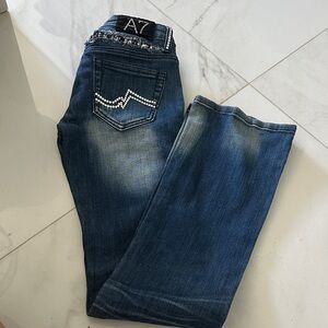 Elegant Boot Cut Jeans with Embellished Pockets